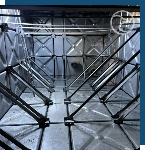 Field-installed stainless steel tank for potable water and industrial applications