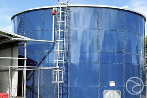 Engineers assembling a glass fused to steel water tank at a municipal site