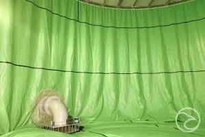 Commercial tank liner installation in industrial storage tank