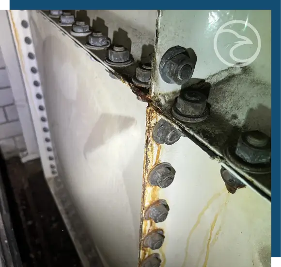 Fiberglass tank crack restoration using reinforced resin